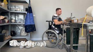 Ukrainian veteran amputees fight back in prosthetics lab