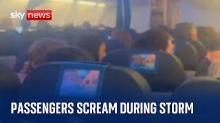 Passengers scream and cry as flight battered by powerful storm