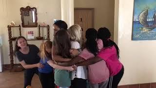 Students Wrap Dr. Wood in a Group Hug