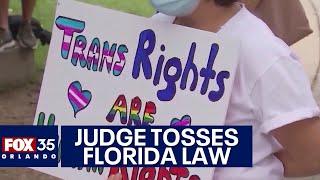 Advocates of gender-affirming care react after judge strikes down Florida law