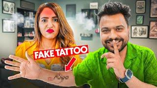 HE GOT A TATTOO OF SOME OTHER GIRL'S NAME!  (किसी और लड़की के नाम का टैटू बनवाया)