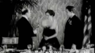 Bette Davis & Spencer Tracy win Oscar for "Jezebel" & "Boys Town", respectively