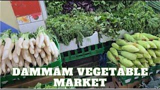 Purchasing VEGETABLES at DAMMAM MARKET Vegetable Section.