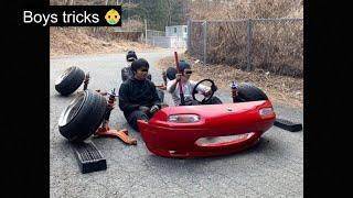 Boys vs man car tricks