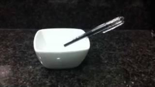 Cesaral Psychokinetic pen coming out of  bowl (www.cesaral.com)