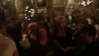 Carol singing in Cronin's Pub, with the Crosshaven Singers