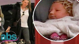 Behati Prinsloo's newborn daughter Gio Grace wears leopard print hat