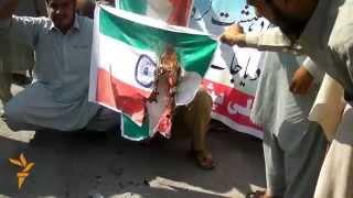Pakistanis Burn Indian Flag After Border Shooting