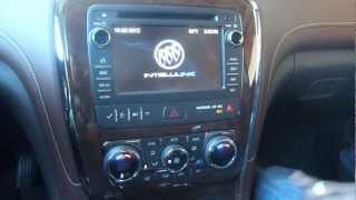 Buick's Global Interior Designer Michael Burton with the 2013 Buick Enclave