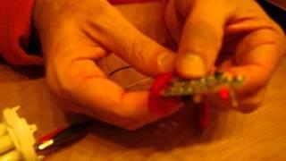 Lighting an 11W 220 V CFL using a 1.5 V AAA battery and a CVS disposable camera flash circuit