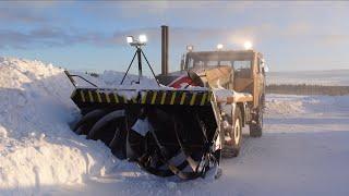 Snow clearing with old military snowblower