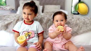 BABY VS LEMON!!! **WHOEVER MAKES A FACE FIRST LOSES**