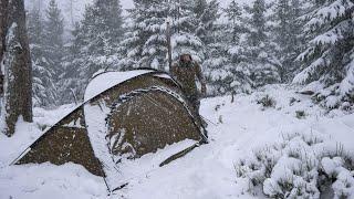 Hot tent winter solo overnighter in deep snow