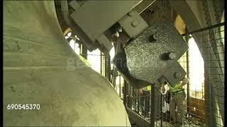 close up shot of hammer chiming big quarter bell and big ben