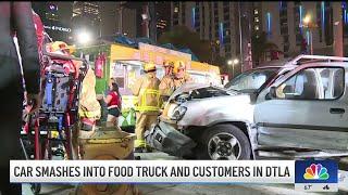 Car smashes into food truck and customers in downtown LA