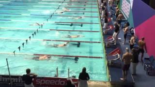 Bjorn Hoffmann swimming 100m IM 1:04.65, 2nd lane from bottom