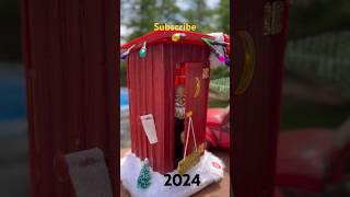 2 - Big Lots Animated Christmas Outhouse with pop out Santa Claus “Dashing through the snow” 2024