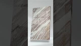 Toronto Marble from Vardhman Sagar Marbles has an off-white, light coffee, and brown color pattern.