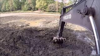 Excavator Loading Out Mud