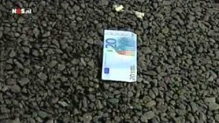 Money over highway A2 Netherlands A money transport truck this morning on the A2 in Beek lost a box of money