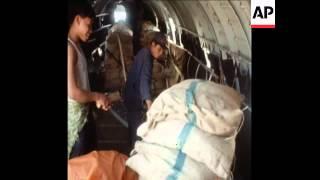 SYND 11/02/71 THE CIA'S PRIVATE AIRLINE, "AIR AMERICA", DROPPING RELIEF SUPPLIES OF RICE TO LAOTIAN