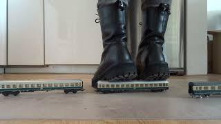 Altercore Army / Ranger Boots stomp, trample and destroy some vintage model train wagons