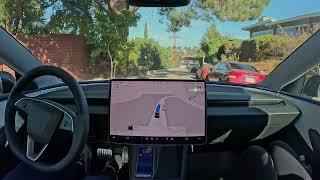 Raw 1x: Tesla FSD 13.2.2 Performs a U-turn on a Narrow Street