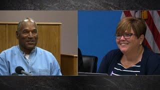 See O.J. Simpson laugh with parole commissioner