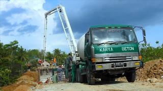 Ready Mix Cement Mixer Pump Trucks Pouring Concrete On The Bridge Construction