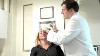 Dr Norman Rowe injects Botox in a female patient