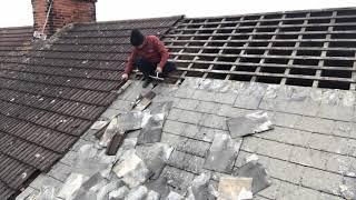 Stripping the front of a slate roof