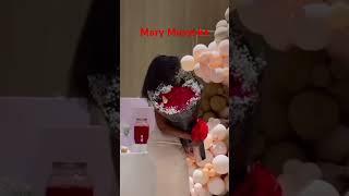 Mary musyoka gifts Trisha bouquet of flowers