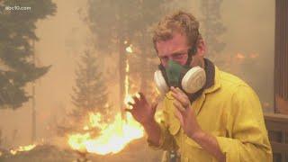 John Bartell at Echo Summit Lodge with firefighters battling Caldor Fire