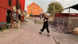 Swedish Summer Walks: Nyköping harbor. Evening street life in the Nordic light