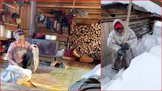 life of north hobbits in small wooden huts in a forest. reindeer people. khanty