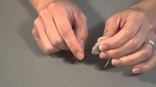 Using Controls on Behind the Ear (BTE) Hearing Aids - Boys Town National Research Hospital