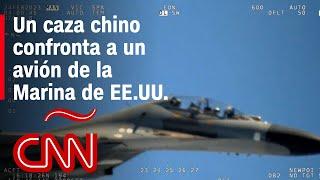 Un caza chino confronta a un avión de la Marina de EE.UU.