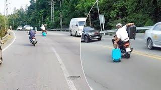 Carrying Suitcases To The Airport On Motorcycle