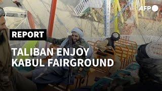 Taliban fighters hit a Kabul fairground as Afghans fear for freedoms | AFP