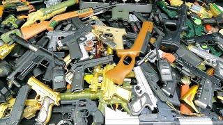 A Lot of Toy Guns - Toy Pistols in the Box.