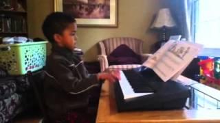 Zaya playing the piano