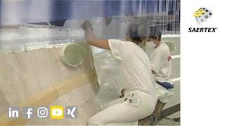 SAERfix: adhesive and self-adhesive fabrics to ease the lay-up in vertical parts of closed molding