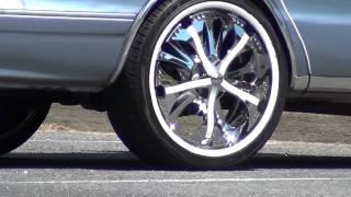 Chevy car with 22 inch SPINNER CHROME RIMS!!!!!