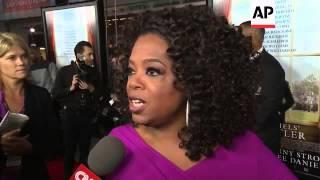 Oprah Winfrey apologises to the Swiss over media coverage of her experience in Swiss shop