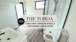 Ruru Tiny Homes: The Toroa - double storey two bedroom tiny home on wheels - With a back door