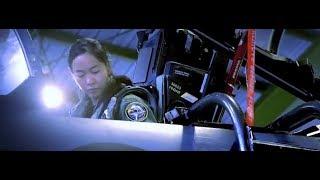 RSAF Female F-15 fighter pilot Major Nah Jinping strapped into cockpit