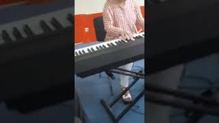 The youngest girl plays the piano