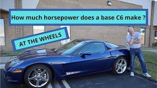 How much horsepower does a base model C6 Corvette make at the rear wheels ??