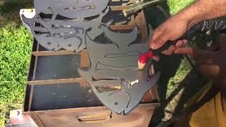 Metal art plasma cutting and forming a Spade fish