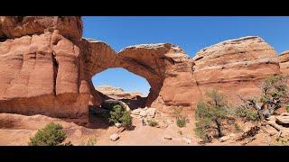 Arches Sand and Broken Arches Hiker Edit